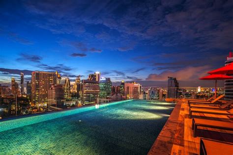 Premium Photo | Swimming pool and roof top bar on hotel deck in bangkok city thailand on 6aug2020