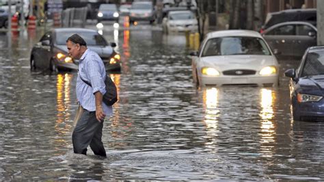 Watch: Manholes erupt in Miami floods | CNN