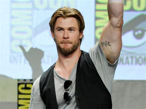 A Guide to Chris Hemsworth's Known Tattoos and Meanings