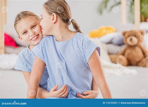 Two sisters hugging stock image. Image of loving, friendship - 116722521