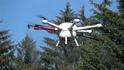 Watering my garden with a drone: Fresh water spray test with Timberdrone - YouTube