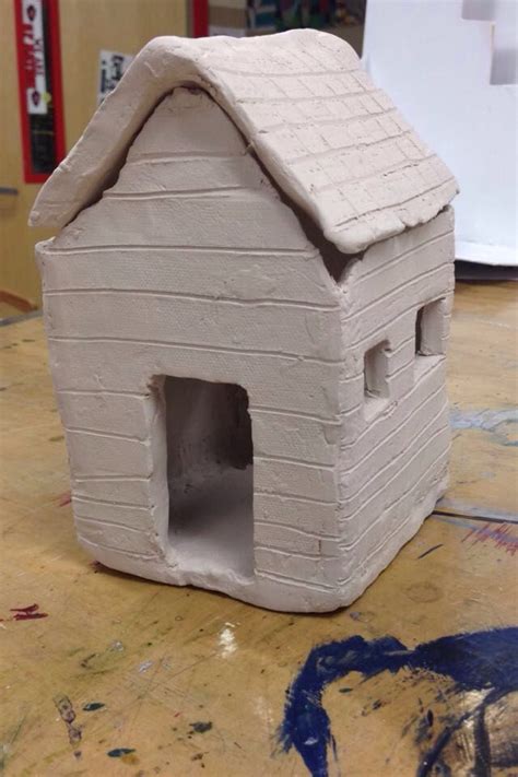 Clay house I'm making in my art class! Still have to glaze it, but here it is after it was fired ...