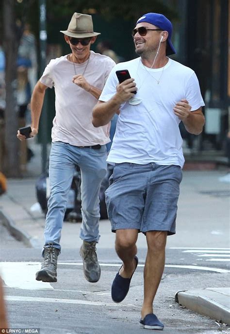 Leonardo DiCaprio giggles while being chased by Lukas Haas in New York ...