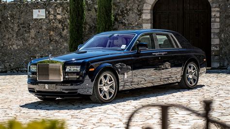 Black Rolls Royce Phantom parked on concrete pavement during daytime HD ...