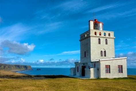 Dyrhólaey lighthouse, on the south coast of Iceland, not far from the village Vík | Lighthouse ...