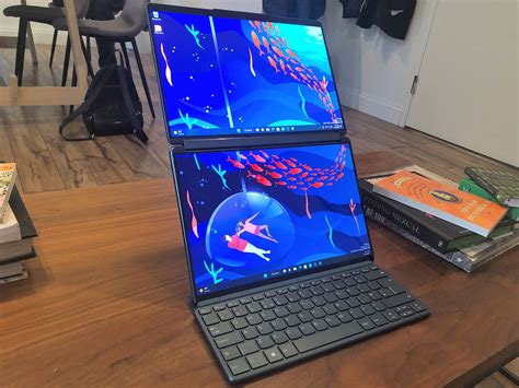 Lenovo demos laptop that rolls from 13 to 15 inches with the flip of a switch | Ars Technica