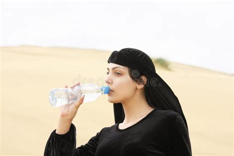 Woman Drinking Water from Bottle Stock Photo - Image of cute, sideways: 16077400