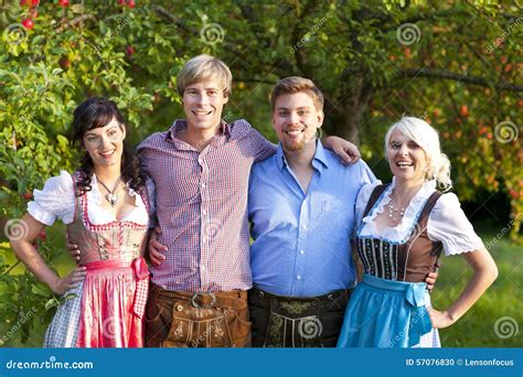 Happy Group of Bavarian People Stock Photo - Image of trouser, four: 57076830