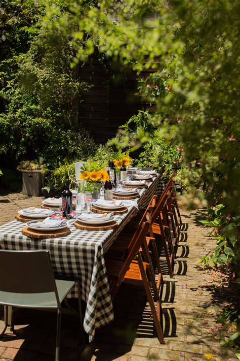 black and white tablecloth for outdoor dinner party | Backyard dinner party, Black and white ...