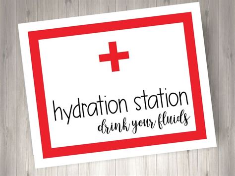 a red and white sign that says, hydration station drink your fluids