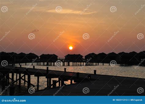 Maldives Island Beach Houses Sunset Stock Image - Image of shore, blue ...