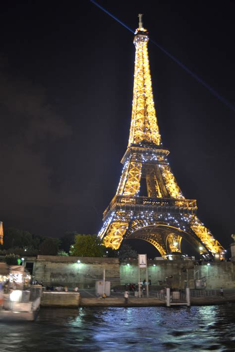 The Eiffel Tower taken at night during a river cruise. | Smithsonian ...