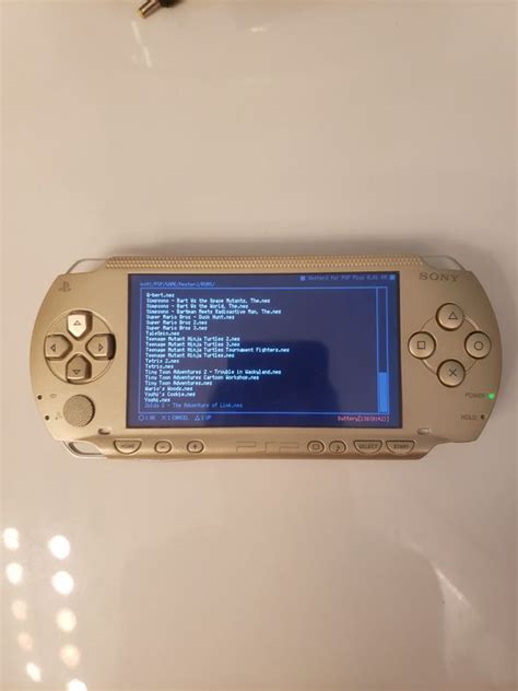 Modded Gold PSP 1000 w/ over 1000 games (PSP, PS1, Sega Genesis, N64 ...