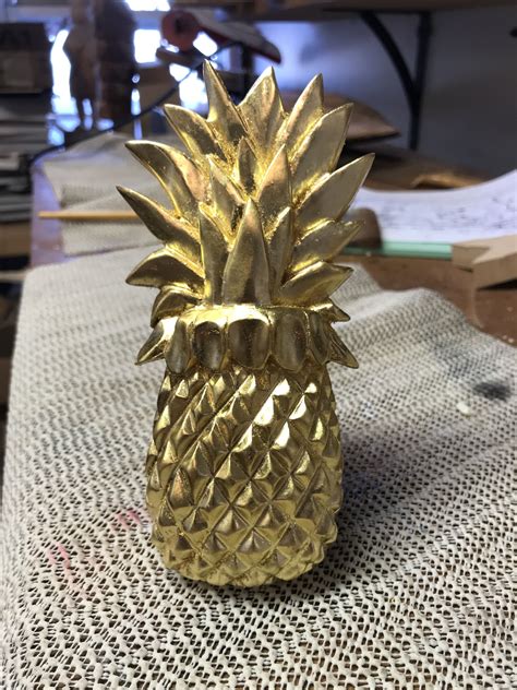 Hand carved gilded pineapple sculpture