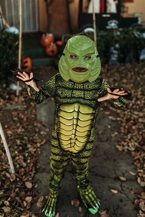 Young Boy Dressed As Sea Monster Posing In Costume At Halloween Photograph by Cavan Images - Pixels