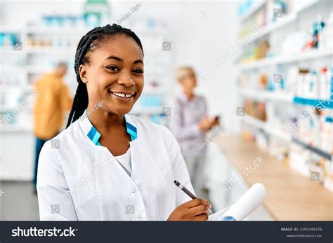 Happy African American Female Pharmacist Going Stock Photo 2195745579 | Shutterstock