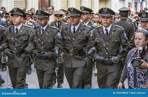 Cuenca, Ecuador / December 24, 2015 - Ecuadorian Army Officers Walk Arm-in-arm Creating Blockade ...