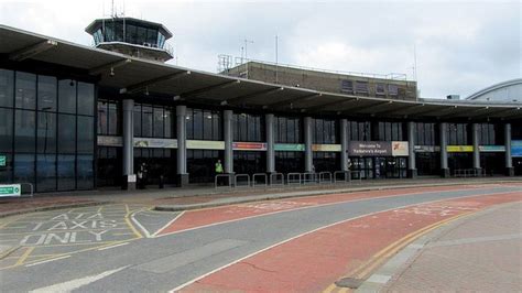 Leeds Bradford Airport evacuated in security scare - BBC News