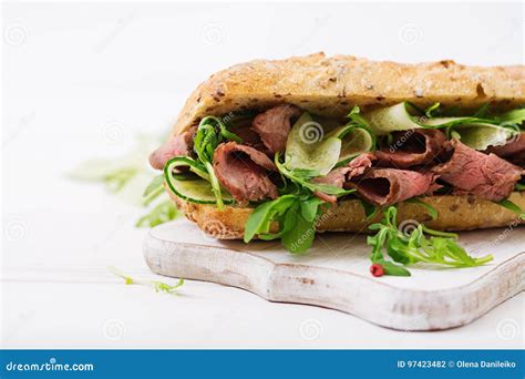 Sandwich of Whole Wheat Bread with Roast Beef Stock Photo - Image of ...