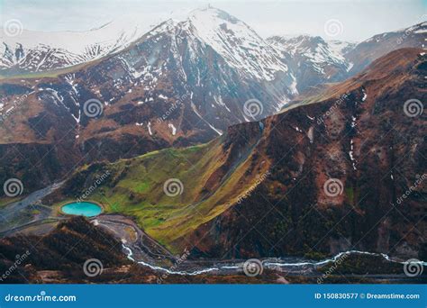 Snowy Mountains and Blue Lake in Green Valley Stock Image - Image of ...