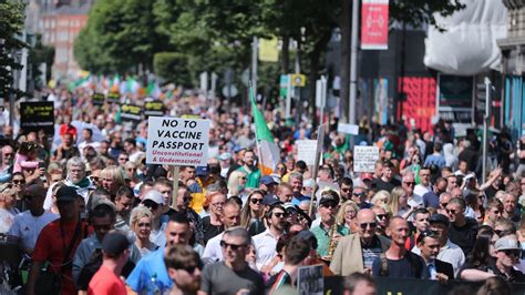 Protesters take to streets in Dublin and Belfast against Covid-19 jabs ...