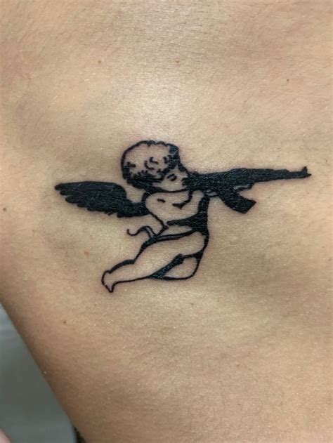 Baby Angel Cherub Tattoo Designs : Angel Tattoo Wing Designs Wings ...