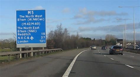 When a motorway sign tells you how many miles to London, where in London do they measure it to ...