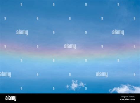 Solar Halo with Rainbow Colors in a Blue Sky Stock Photo - Alamy