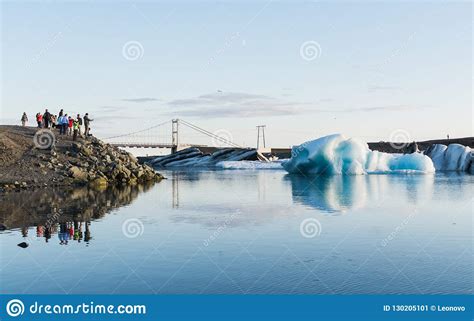 JOKULSARLON, ICELAND - AUGUST 2018: People Taking Pictures of Iceberg in the Water of ...