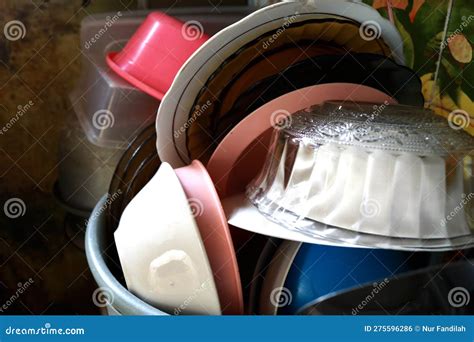 A Pile of Dishes in the Kitchen of a House Stock Photo - Image of pile ...