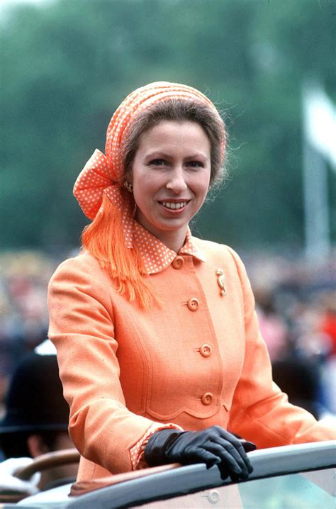 Princess Anne wore a tangerine polka dot scarf/hat combo at a charity ...