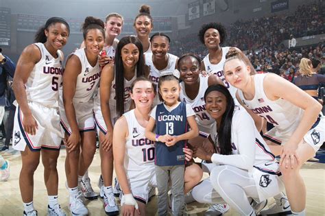 UConn women’s basketball team surprises 8-year-old girl with trip to ...