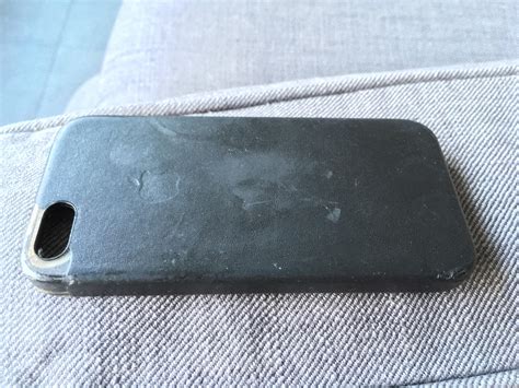 My black SE Leather Case after 1 year : r/iphone