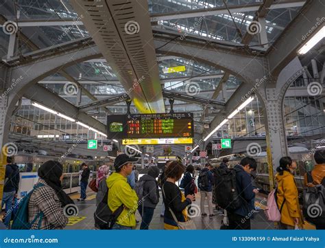 Commuters Queue Up Waiting for Train Arrival at Osaka Station, Editorial Stock Image - Image of ...