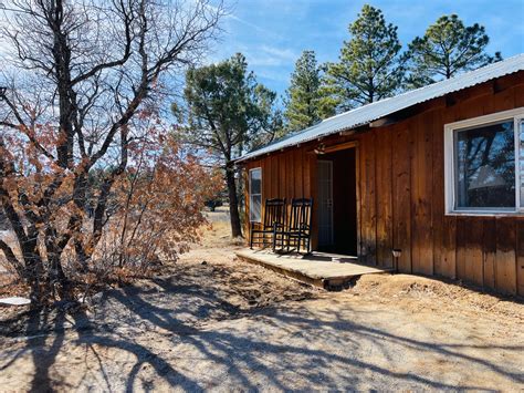 Our Cabins & Rooms — Manzano Mountain Retreat