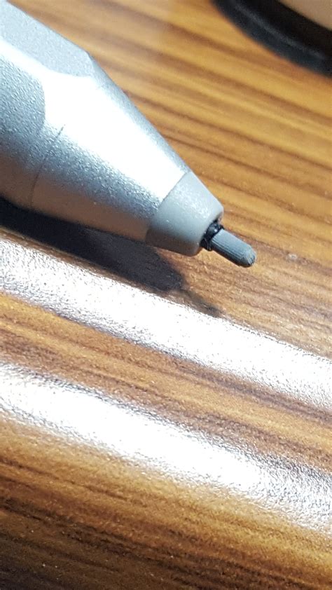 surface pen material broken around the tip - Microsoft Community