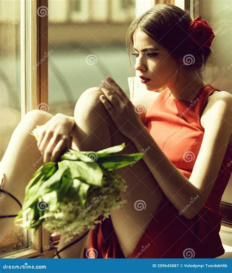 Beautiful Girl Sitting on Window with Bouquet of Flowers, Beauty and Fashion, Love Teen and ...