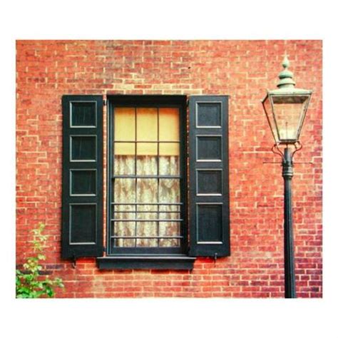 Here are some decorative four panel black exterior shutters. | Shutters ...