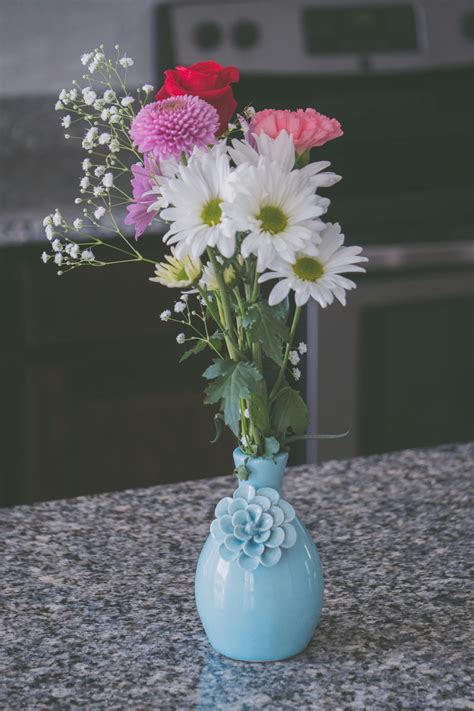 Assorted Flowers in Blue Vase · Free Stock Photo