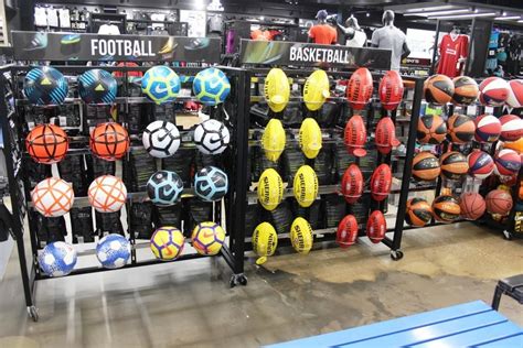 H Rack sports display #adpstorefixtures #visualmerchandising #sports #shopfitting Football Gear ...