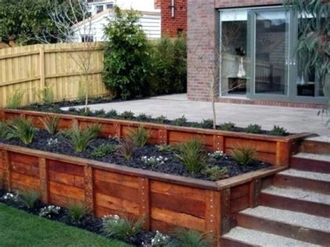 Sloping Garden | Backyard retaining walls, Small garden retaining wall ...