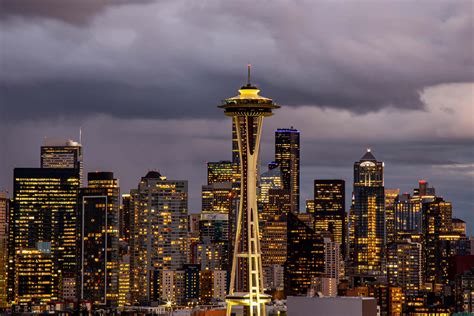 Download Beautiful Seattle Skyline Illuminated at Night | Wallpapers.com