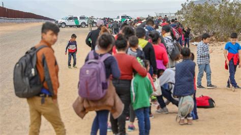 Largest single group of migrants ever tunnels under border wall in ...