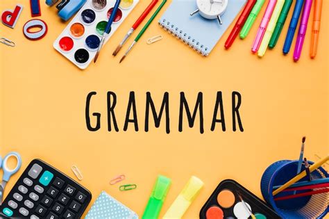 Free Photo | Grammar background with school supplies