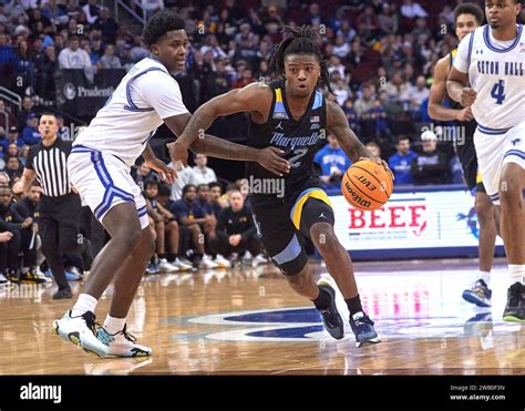 Marquette Golden Eagles guard Sean Jones (22) penetrates toward the basket in the first half ...