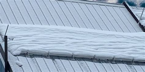 Do Metal Roofs Need Snow Guards? - New England Metal Roofing