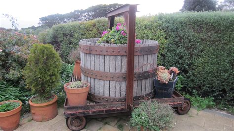 I love this wine barrel garden idea in front of the Cellar doors Sunset Wineries, Kangaroo ...