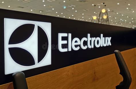 Closeup of an Illuminated Sign with the Electrolux Logo in Electronics ...