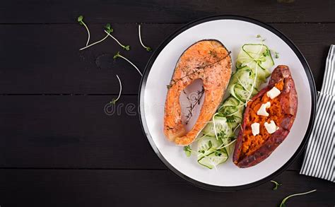 Healthy Food: Baked Salmon and Sweet Potato and Vegetables. Stock Photo ...