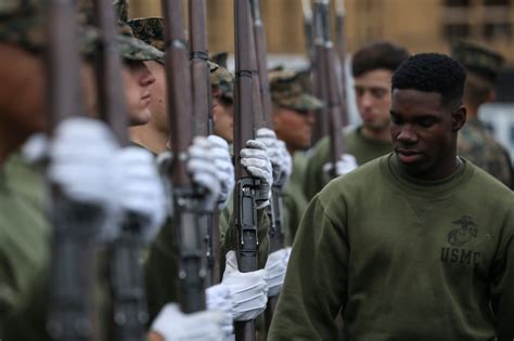 Marines with Alpha Co. practice rifle drill